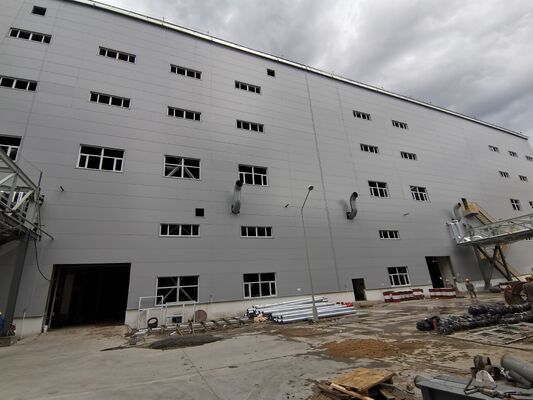 Large Span Metal Structure Warehouse Raw Material Storage Building Z‑type Purlin Wall Panels Disassembled Container Shipment